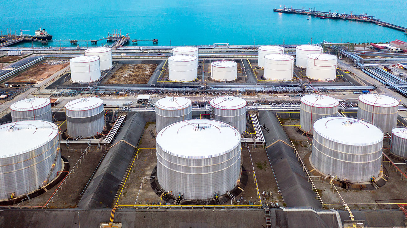 Oil and petrochemical tank, storage of oil and petrochemical products ready for logistic and transport business. Aerial view.